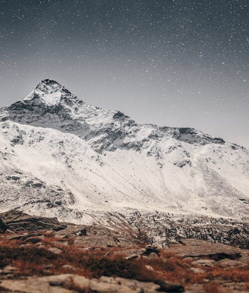 Mountain Landscapes - A breathtaking view of a snow-covered mountain p #10360758