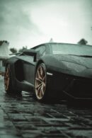 Luxury Cars - Close-up of a Lamborghini Aventador parked on a #10584720