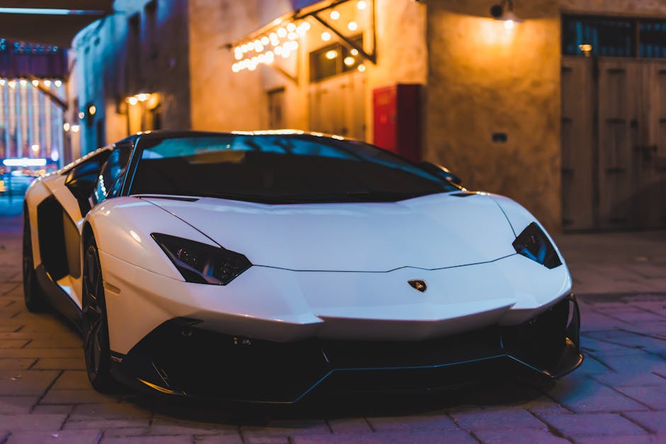 Luxury Cars - White sports car with sleek design parked in an #14196938