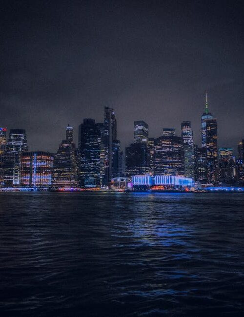 City Architecture - Stunning nighttime view of the illuminated New Y #18325210