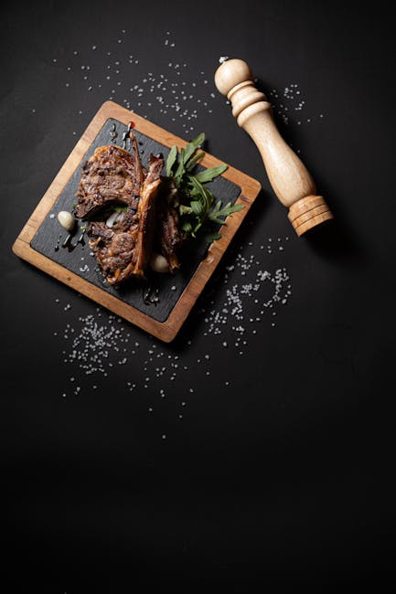Food Aesthetics - Delicious lamb chops styled with herbs and coars #25243825