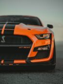 Luxury Cars - Close-up of a striking orange sports car GT500 m #27819060