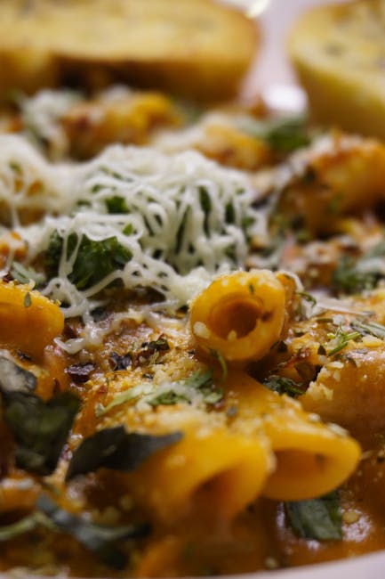 Food Aesthetics - Close-up of rigatoni pasta topped with melted ch #30823033