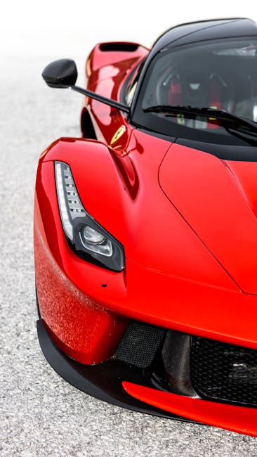 Luxury Cars - Close-up of a vibrant red sports car highlightin #31078736