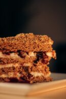 Food Aesthetics - A tempting slice of layered cake with cream and #34159031