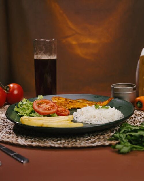 Food Aesthetics - Delicious Brazilian dish featuring rice, fish, a #34520961