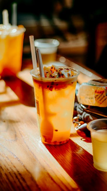 Food Aesthetics - Iced bubble tea on a sunny cafe table, casting w #35137071
