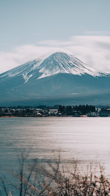 Mountain Landscapes - Beautiful view of Mount Fuji with a serene lake #36495792