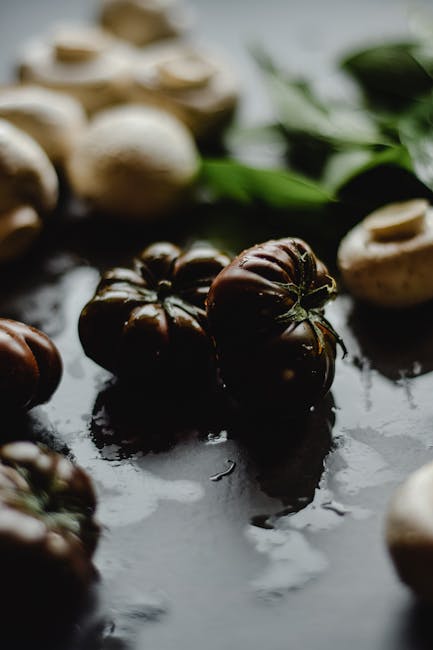 Food Aesthetics - Wet mushrooms and heirloom tomatoes arranged on #5500970