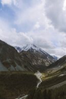 Mountain Landscapes - A stunning aerial view of a tranquil valley with #8761447